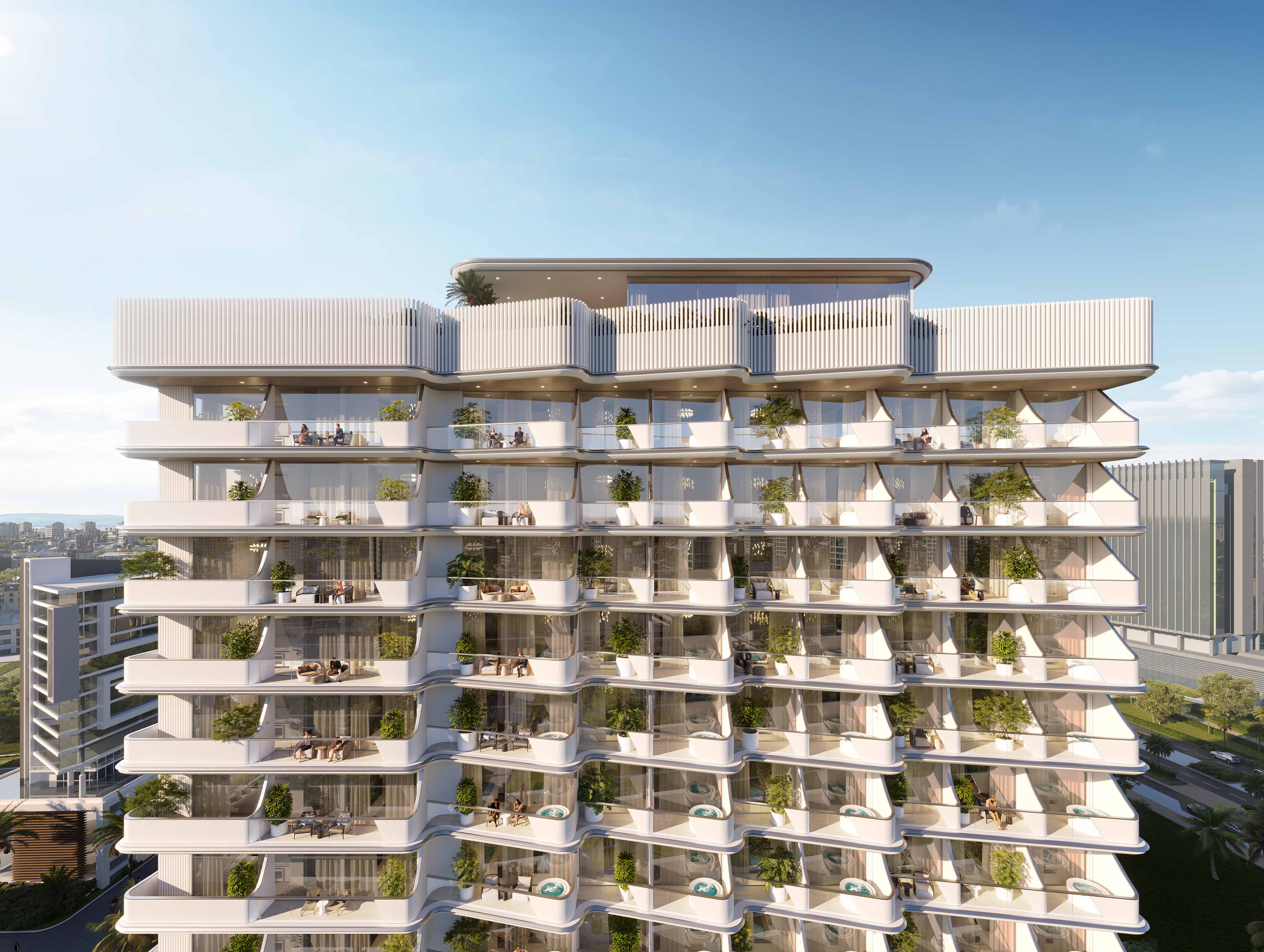Cove Edition I By Imtiaz 1 Modern architectural building with multiple balconies, greenery, and residents enjoying outdoor spaces under a blue sky.